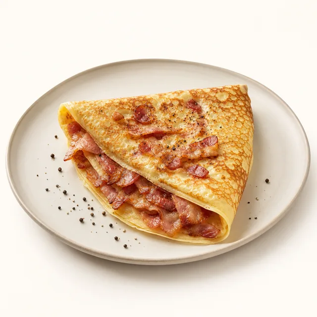 Thin pancakes with bacon, prepared