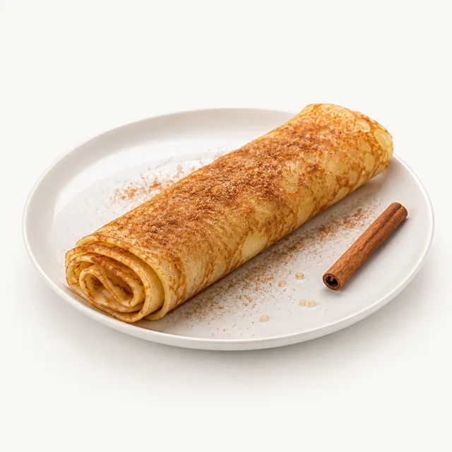 Crêpe fine au sucre et cannelle, préparée