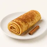 Omelette tipo "crêpes" al zucchero con cannella, preparato