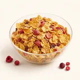 Pétales de céréales, à base de blé complet et de riz, avec fruits rouges